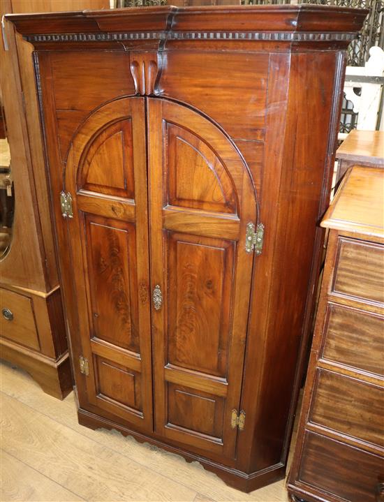 A mahogany corner cabinet W.97cm